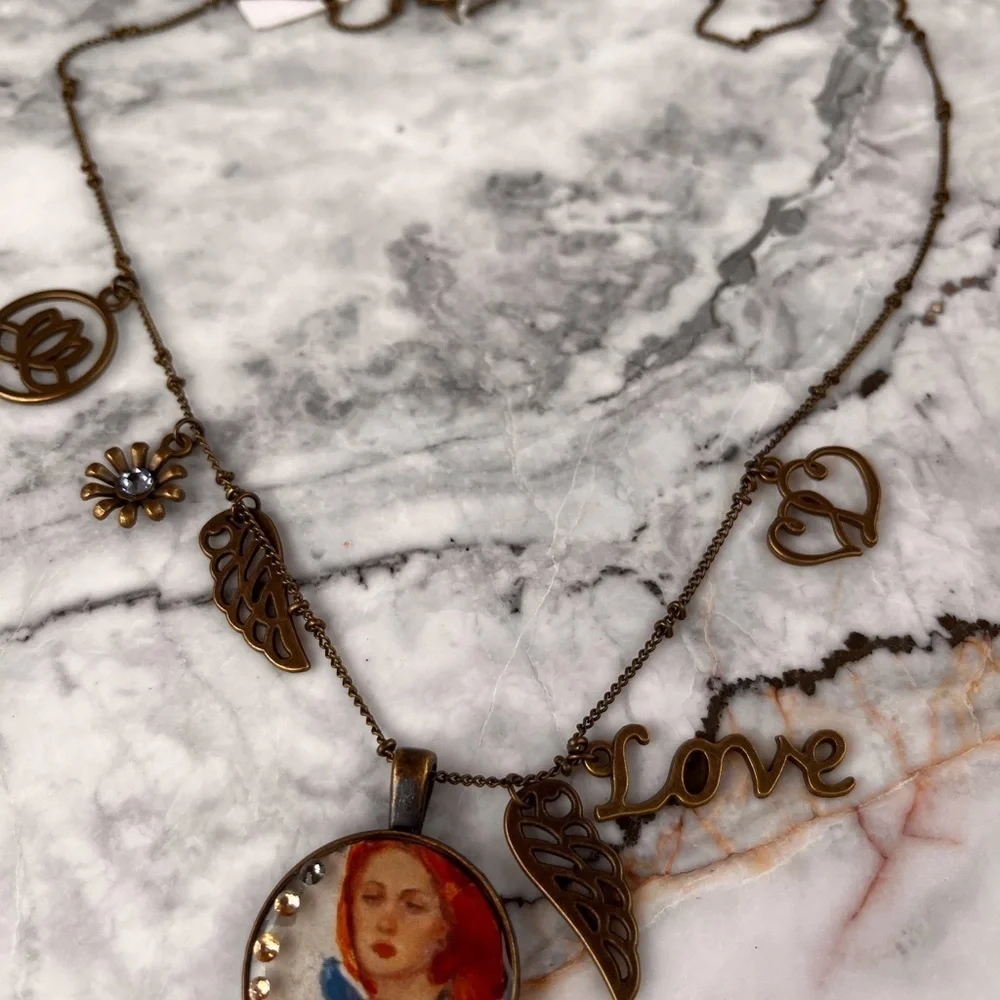 Handmade necklace with portrait and charms